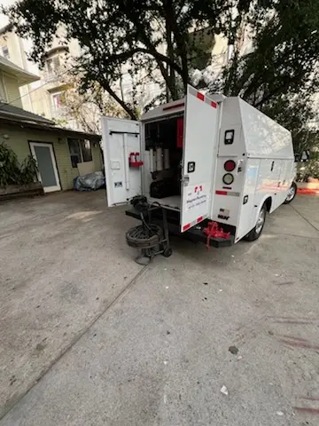 Magnet Plumbing service vehicle on-site for Grease Trap Cleaning in Morro Hills
